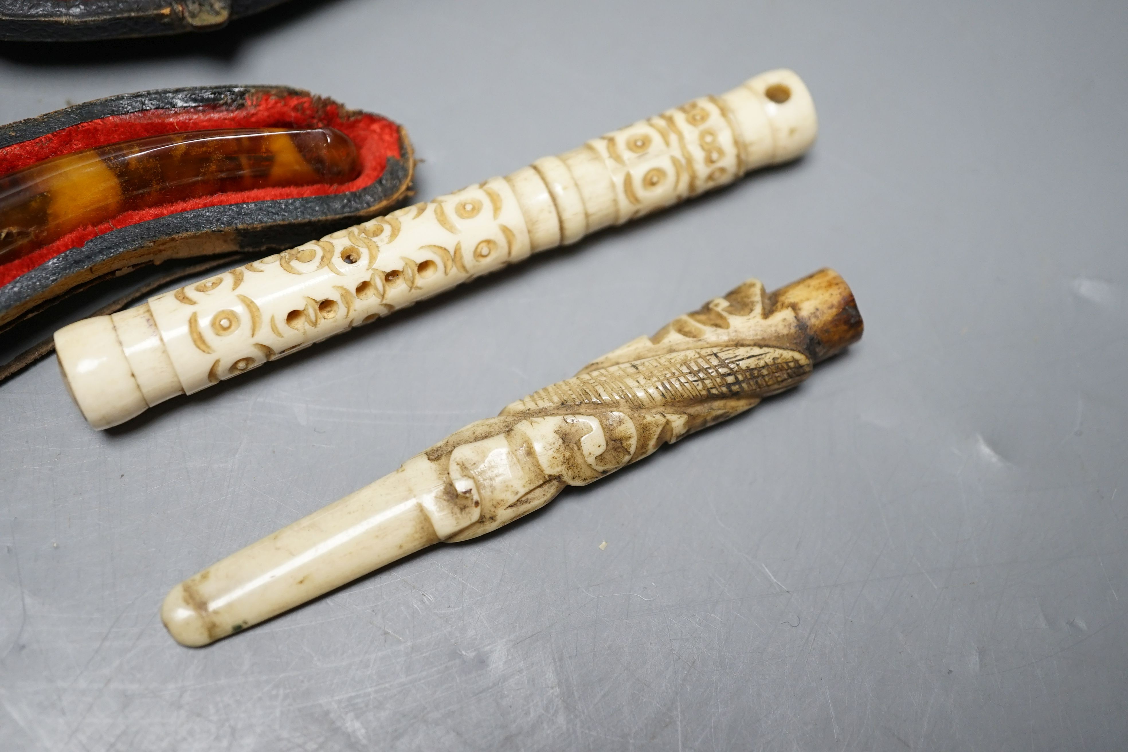 Three cased meerschaum pipes, another pipe and two bone cheroot holders